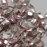 Asymmetrical sequin